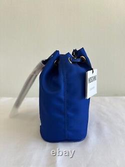 AW20 Moschino Couture Jeremy Scott Blue Bucket Bag with Teddy Bear on cake